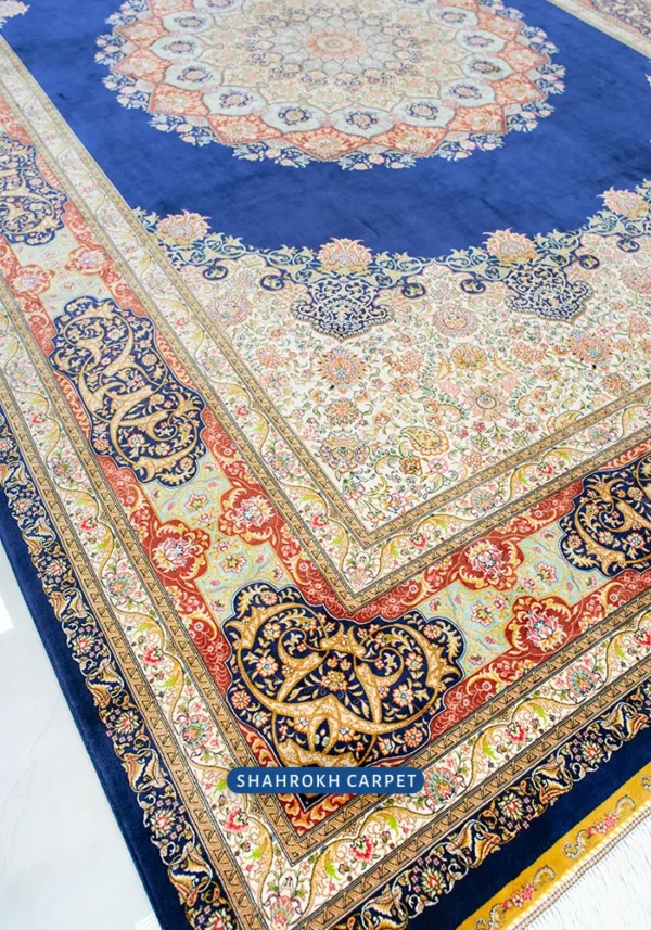 Machine made silk rug Q250, Davoodi design, classic Qom style,cobalt blue. Ideal for bulk purchase from Shahrokh Carpet Company.